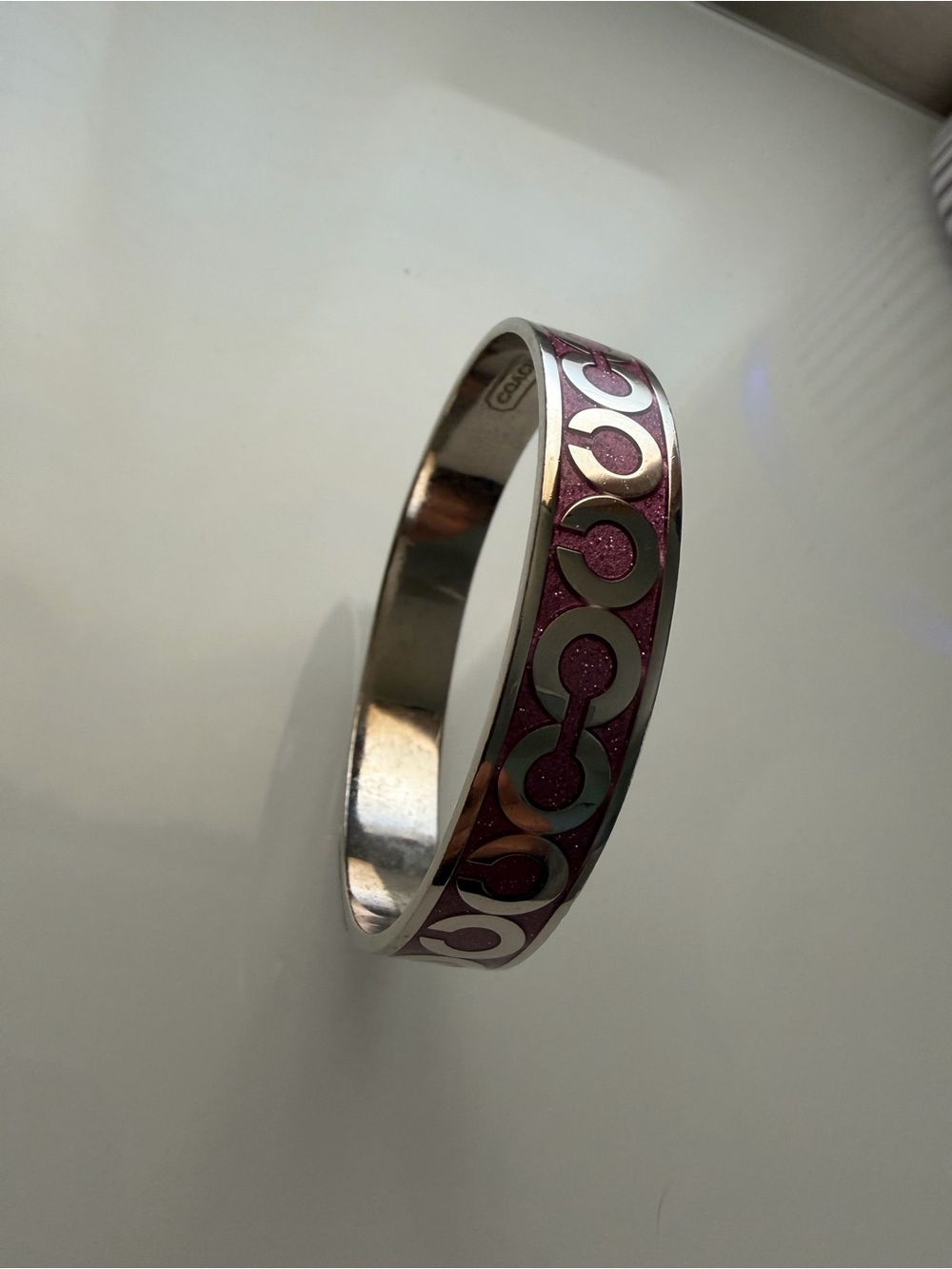 Coach Silver-Tone Bangle with Pink Enamel Signature Link
